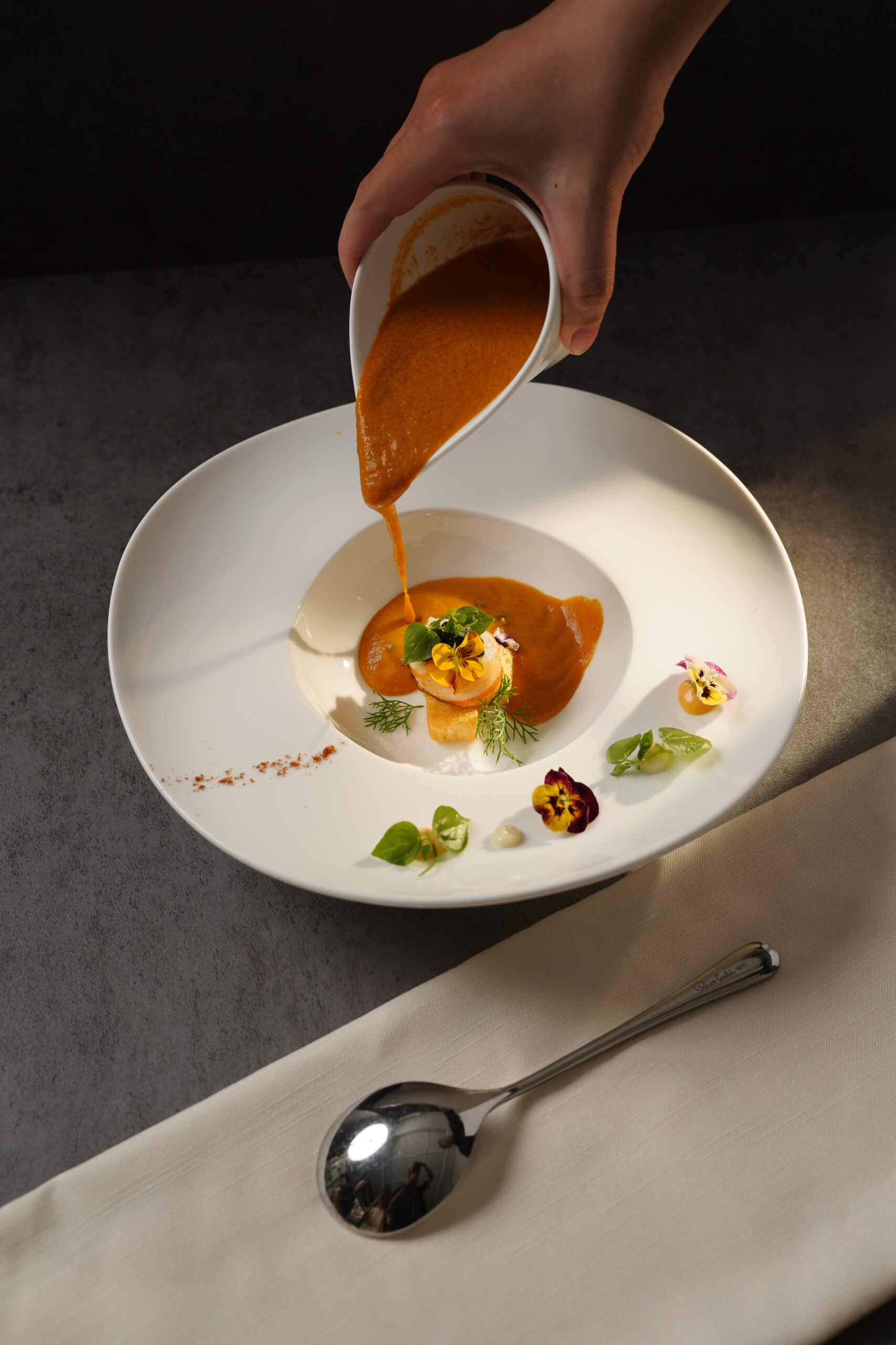 Chef plating gourmet dish
